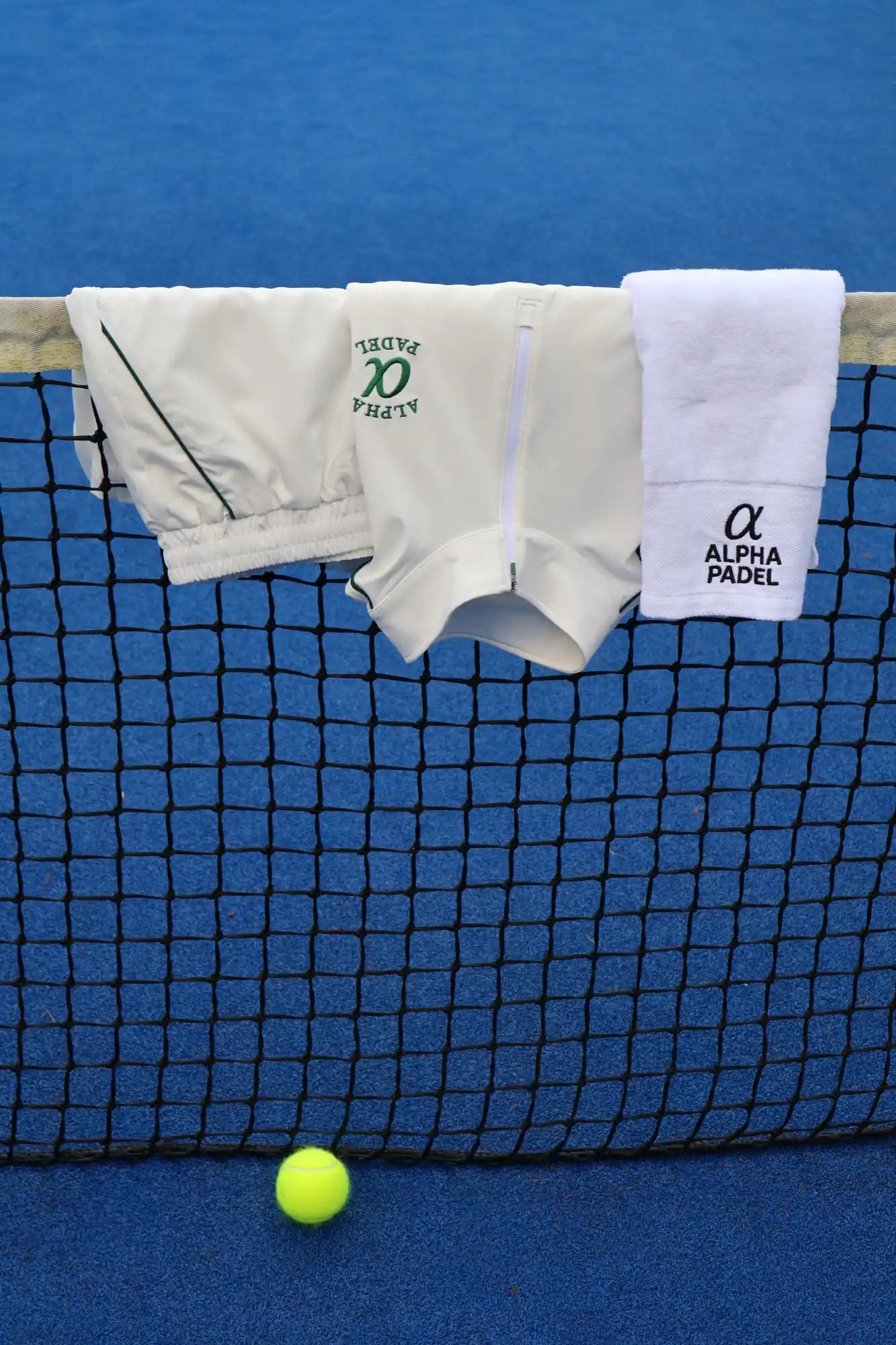 Polo___shorts_and_towel_on_Net.webp